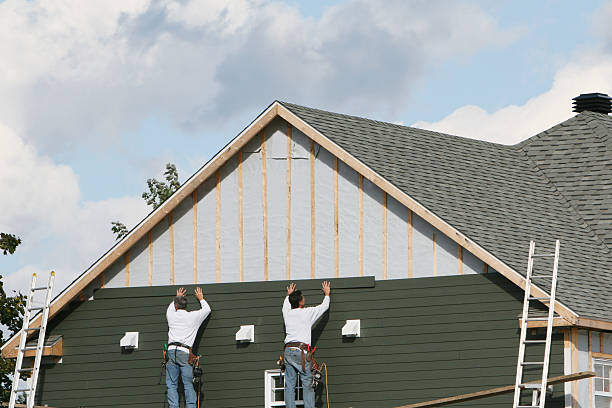 Professional Storm Damage Siding Repair technician working in Wickhaven, PA